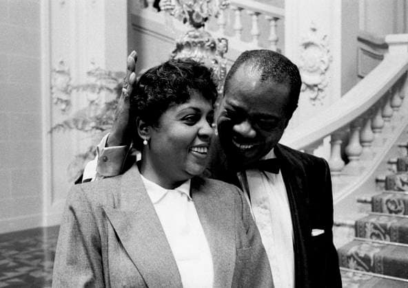 RECORD DATE NOT STATED Louis Armstrong and his wife, Lil, on the set of High Society, MGM 1956. EDITORIAL USE ONLY  Copyright: x