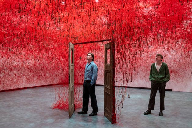 February 16, 2026, London, London, UK: LONDON, UK. Staff members with Ã¢â‚¬ËœThreads of LifeÃ¢â‚¬â ¢, 2026, at a preview of Chiharu Shiota: Threads of Life, a new exhibition by Japanese performance and installation artist Chiharu Shiota at the Hayward Gallery presenting her iconic floor-to-ceiling weblike works made of red, white and black thread. The show runs 17 February to 3 May 2026. London UK  - ZUMAl94_ 20260216_zaf_l94_009 Copyright: xStephenxChungx