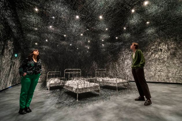 February 16, 2026, London, London, UK: LONDON, UK. Staff members with Ã¢â‚¬â ¢During SleepÃ¢â‚¬â ¢, 2026, at a preview of Chiharu Shiota: Threads of Life, a new exhibition by Japanese performance and installation artist Chiharu Shiota at the Hayward Gallery presenting her iconic floor-to-ceiling weblike works made of red, white and black thread. The show runs 17 February to 3 May 2026. London UK  - ZUMAl94_ 20260216_zaf_l94_015 Copyright: xStephenxChungx