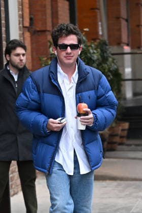Singer Charlie Puth holds an apple while leaving his New York City hotel for TV interviews as he is seen for the first time since his Superbowl performance Featuring: Charlie Puth Where: New York City, New York, United States When: 18 Feb 2026 Credit: Elder Ordonez INSTARimages EDITORIAL USE ONLY. NOT FOR USE BY NEWSPAPERS BASED IN THE UK. Copyright: xx instar55482489