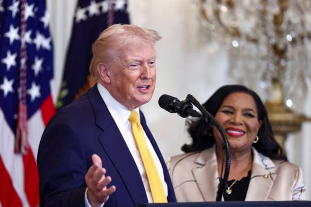 February 18, 2026, Washington, District Of Columbia, USA: United States President Donald Trump speaks at a reception for Black History Month in the East Room of the White House in Washington, DC, USA, 18 February 2026. The event comes less than two weeks after President Trump™s Truth Social account shared a racist video of former President Barack Obama and former First Lady Michelle Obama. Alice Marie Johnson, the White House Pardon Czar, looks on from right Washington USA  - ZUMAs152 20260218_faa_s152_052 Copyright: xJimxLoScalzox-xPoolxviaxCNPx