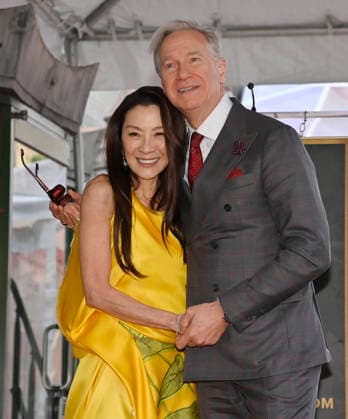 Actress Michelle Yeoh is joined by director Paul Feig during an unveiling ceremony honoring her with the 2,836th star on the Hollywood Walk of Fame in Los Angeles on Wednesday, February 18, 2026.  LAP2026021811 JIMxRUYMEN