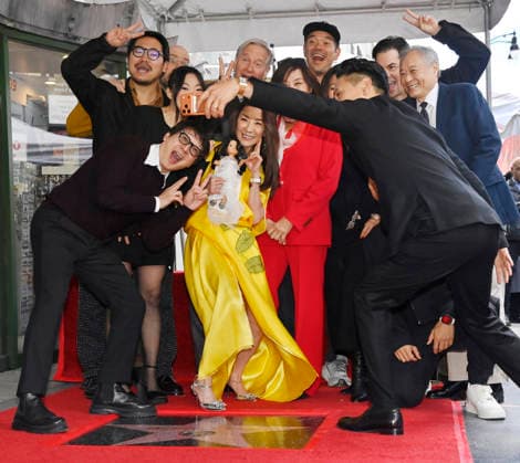 L-R) Daniel Kwan, Awkwafina, Ke Huy Quan, Paul Feig, honoree Michelle Yeoh, Janet Yang, Destin Daniel Cretton, Sandra Oh, Jonathan Wang, Bing Chen, Ang Lee and Jon M. Chu take a selfie during an unveiling ceremony honoring her with the 2,836th star on the Hollywood Walk of Fame in Los Angeles on Wednesday, February 18, 2026.  LAP2026021818 JIMxRUYMEN