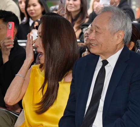 Actress Michelle Yeoh (L) and director And Lee react to comments during an unveiling ceremony honoring her with the 2,836th star on the Hollywood Walk of Fame in Los Angeles on Wednesday, February 18, 2026.  LAP2026021827 JIMxRUYMEN