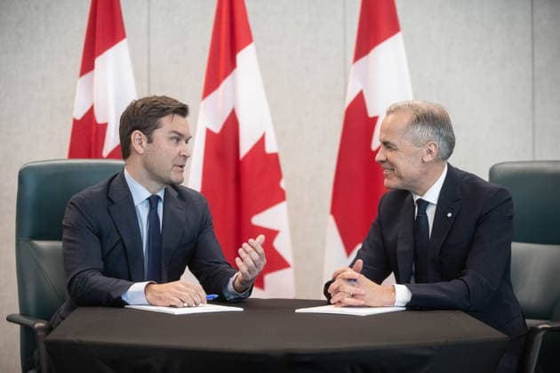 February 18, 2026, Edmonton, Ab, CANADA: Prime Minister Mark Carney and MP Matt Jeneroux meet in Edmonton after Jeneroux crossed the floor to the Liberals on Wednesday, Feb. 18, 2026. Edmonton CANADA  - ZUMAc35_ 20260218_zaf_c35_254 Copyright: xJasonxFransonx