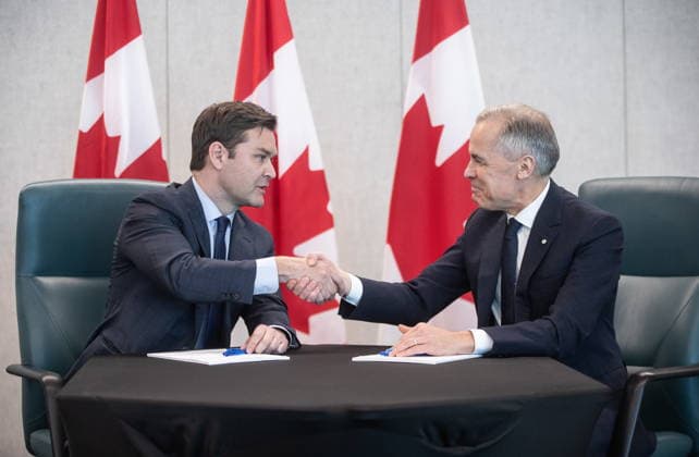 February 18, 2026, Edmonton, Ab, CANADA: Prime Minister Mark Carney and MP Matt Jeneroux meet in Edmonton after Jeneroux crossed the floor to the Liberals on Wednesday, Feb. 18, 2026. Edmonton CANADA  - ZUMAc35_ 20260218_zaf_c35_255 Copyright: xJasonxFransonx