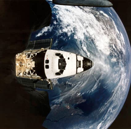 Jul 1, 1995 - Kvant 2, Earth-Orbit - Onboard view from Kvant 2. Docked already with Russia s Mir Space Station and backdropped against a half globe of Earth featuring the Crimean Peninsula, Atlantis is partially visible through a window on the Kvant 2 module. The crew cabin and forward bay are the most prominent. Below center is the Androgynous Peripheral Docking System APDS and the Kristall module on Mir. The APDS is connected to a port in a tunnel leading to the Spacelab science module in Atlantis cargo bay. The linkup enabled the seven STS-71 crew members to visit Mir and it allowed the three Mir-18 crew members, in space since March, access to Spacelab. The Black Sea is directly beneath Atlantis, with Ukraine s diamond-shaped Crimean Pe - ZUMA1072 19950701_cob_z03_904 Copyright: xIMAGO NASAx