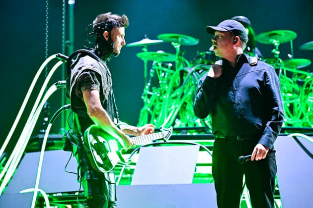 MALMÖ, SWEDEN 20260219 Per Bergquist guitarist in Smash Into Pices who competes with the contribution Hollow , to the right is a stand in from SVT for singer Chris Adam who is ill, in Malmö Arena at Thursdays rehearsal for round 4 of Melodifestivalen 2026 MALMÖ SWEDEN x50090x  Copyright: xJohanxNilsson TTx MELODIFESTIVALEN 2026 MALMÖ REPETITIONER Bx9quofpNoQ
