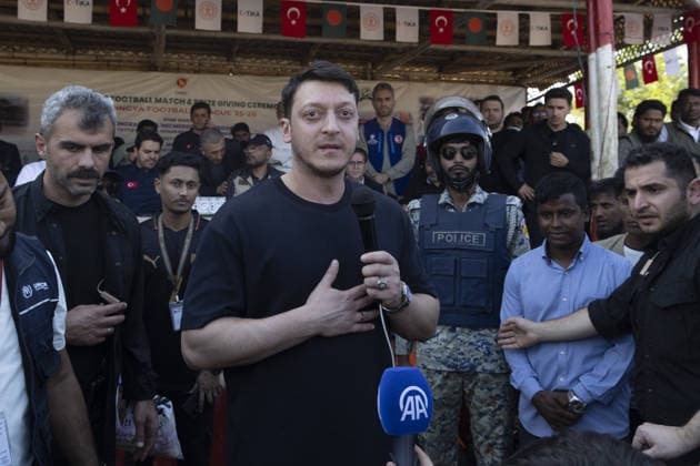 TIKA delegation joins football event in Cox’s Bazar COX S BAZAR, BANGLADESH - FEBRUARY 19: Renowned Turkish football star Mesut Ozil meets athletes during a football tournament organized by TIKA along with Chairman of the Board of Trustees of the Ilim Yayma Foundation, Necmeddin Bilal Erdogan and President of the Turkish Cooperation and Coordination Agency (TIKA), Abdullah Eren in Cox s Bazar, Bangladesh on February 19, 2026. Ozil and Eren also joined the Rohingya participants on the field, playing football together and creating an atmosphere of joy and excitement. The field was filled with Rohingya children, youth, and local residents, making the event lively and festive. Abdul Goni Anadolu Cox s Bazar Bangladesh. Editorial use only. Ple  Copyright: x2026xAnadoluxAbdulxGonix