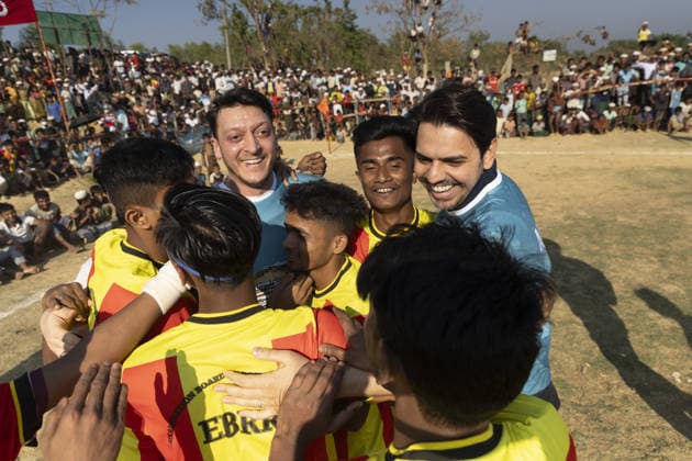 TIKA delegation joins football event in Cox’s Bazar COX S BAZAR, BANGLADESH - FEBRUARY 19: Renowned Turkish football star Mesut Ozil meets athletes during a football tournament organized by TIKA along with Chairman of the Board of Trustees of the Ilim Yayma Foundation, Necmeddin Bilal Erdogan and President of the Turkish Cooperation and Coordination Agency (TIKA), Abdullah Eren in Cox s Bazar, Bangladesh on February 19, 2026. Ozil and Eren also joined the Rohingya participants on the field, playing football together and creating an atmosphere of joy and excitement. The field was filled with Rohingya children, youth, and local residents, making the event lively and festive. Abdul Goni Anadolu Cox s Bazar Bangladesh. Editorial use only. Ple  Copyright: x2026xAnadoluxAbdulxGonix