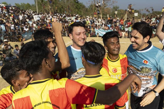 TIKA delegation joins football event in Cox’s Bazar COX S BAZAR, BANGLADESH - FEBRUARY 19: Renowned Turkish football star Mesut Ozil meets athletes during a football tournament organized by TIKA along with Chairman of the Board of Trustees of the Ilim Yayma Foundation, Necmeddin Bilal Erdogan and President of the Turkish Cooperation and Coordination Agency (TIKA), Abdullah Eren in Cox s Bazar, Bangladesh on February 19, 2026. Ozil and Eren also joined the Rohingya participants on the field, playing football together and creating an atmosphere of joy and excitement. The field was filled with Rohingya children, youth, and local residents, making the event lively and festive. Abdul Goni Anadolu Cox s Bazar Bangladesh. Editorial use only. Ple  Copyright: x2026xAnadoluxAbdulxGonix