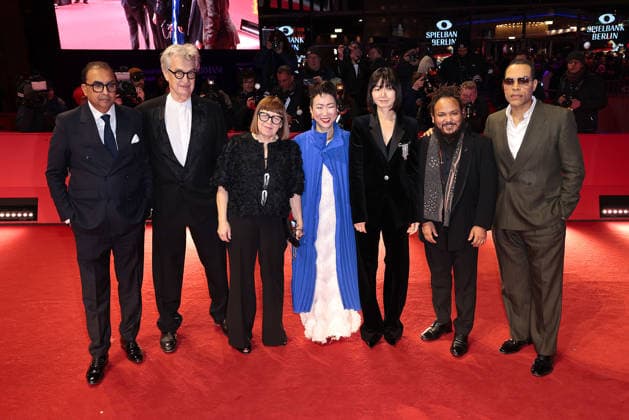 Shivendra Singh Dungarpur, Wim Wenders, Ewa Puszczynska, Hikari, Bae Doona, Min Bahadur Bham and Reinaldo Marcus Green attend the Award Ceremony Red Carpet of the 76th Berlinale International Film Festival Berlin at Berlinale Palast on February 21, 2026 in Berlin, Germany Award Ceremony Red Carpet of the 76th Berlinale International Film Festival Berlin in Berlin, Germany
