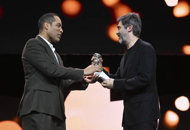 Turkish director Emin Alper wins Silver Bear Jury Prize at Berlin Film Festival BERLIN, GERMANY - FEBRUARY 21: Turkish director Emin Alper (R) receives the Silver Bear Jury Prize for his film Kurtulus (Salvation) during the 76th Berlin International Film Festival (Berlinale) in Berlin, Germany, on February 21, 2026. Halil Sagirkaya Anadolu Berlin Germany. Editorial use only. Please get in touch for any other usage.  Copyright: x2026xAnadoluxHalilxSagirkayax