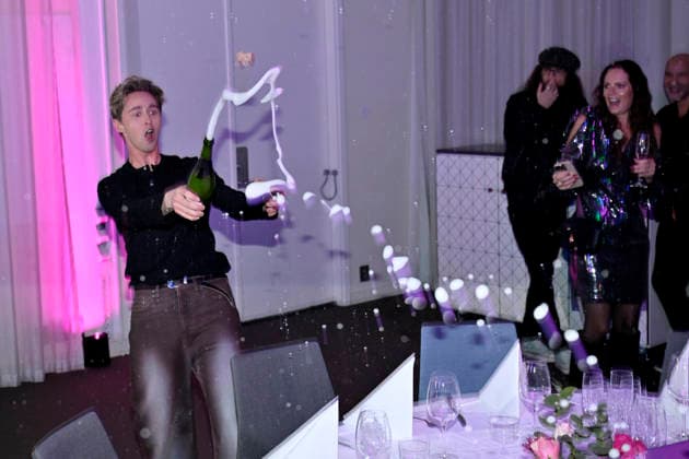 MALMÖ, SWEDEN 20260221 Host Hampus Nessvold sprays champagne at the after-party after round 4 of Melodifestivalen 2026 in Malmö Arena on Saturday MALMÖ SWEDEN x50090x  Copyright: xJohanxNilsson TTx MELODIFESTIVALEN 2026 MALMÖ byG47gtHP9I
