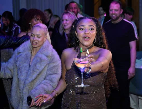 MALMÖ, SWEDEN 20260221 Cimberly celebrates the final place with champagne at the after party after round 4 of Melodifestivalen 2026 in Malmö Arena on Saturday MALMÖ SWEDEN x50090x  Copyright: xJohanxNilsson TTx MELODIFESTIVALEN 2026 MALMÖ bMnomONVM1E