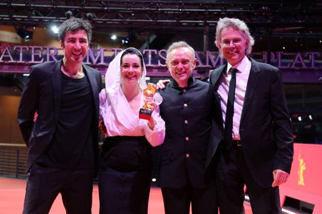 February 21, 2026, Berlin, Germany: Ilker Catak, with cast and crew pose with the Golden Bear for Best Film for Gelbe Briefe (Yellow Letters) after the closing ceremony of the 76th Berlin International Film Festival (Berlinale), Europe s first major film festival of the year, in Berlin. The festival runs from February 12 to 22, 2026. Berlin Germany  - ZUMAf146 20260221_zip_f146_001 Copyright: xRouzbehxFouladix