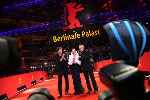 February 21, 2026, Berlin, Germany: (L-R) Ilker Catak, Ozgu Namal, and Tansu Bicer pose with the Golden Bear for Best Film for Gelbe Briefe (Yellow Letters) after the closing ceremony of the 76th Berlin International Film Festival (Berlinale), Europe s first major film festival of the year, in Berlin. The festival runs from February 12 to 22, 2026. Berlin Germany - ZUMAf146 20260221_zip_f146_011 Copyright: xRouzbehxFouladix