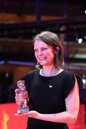 February 21, 2026, Berlin, Germany: Director Genevieve Dulude-de Celles poses with the Silver Bear for Best Screenplay for Nina Roza after the closing ceremony of the 76th Berlin International Film Festival (Berlinale), Europe s first major film festival of the year, in Berlin. The festival runs from February 12 to 22, 2026. Berlin Germany - ZUMAf146 20260221_zip_f146_026 Copyright: xRouzbehxFouladix