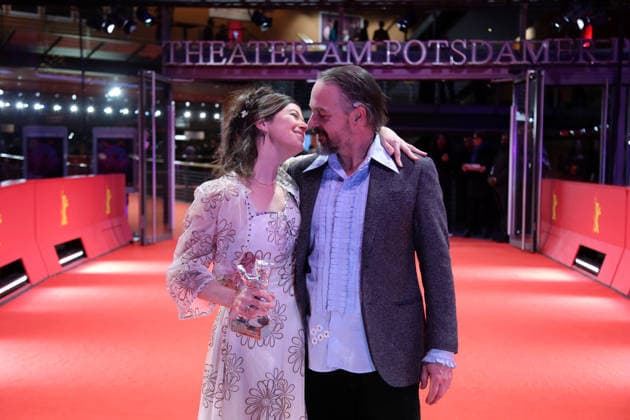 February 21, 2026, Berlin, Germany: Anna Fitch (L) and Banker White pose with the Silver Bear for Outstanding Artistic Contribution for Yo (Love is a Rebellious Bird) after the closing ceremony of the 76th Berlin International Film Festival (Berlinale), Europe s first major film festival of the year, in Berlin. The festival runs from February 12 to 22, 2026. Berlin Germany  - ZUMAf146 20260221_zip_f146_031 Copyright: xRouzbehxFouladix