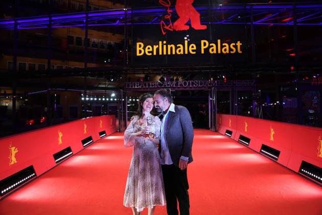 February 21, 2026, Berlin, Germany: Anna Fitch (L) and Banker White pose with the Silver Bear for Outstanding Artistic Contribution for Yo (Love is a Rebellious Bird) after the closing ceremony of the 76th Berlin International Film Festival (Berlinale), Europe s first major film festival of the year, in Berlin. The festival runs from February 12 to 22, 2026. Berlin Germany  - ZUMAf146 20260221_zip_f146_035 Copyright: xRouzbehxFouladix