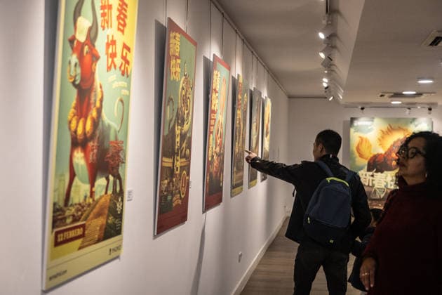 Exhibition of Chinese New Year animal posters by artist Bakea Several people visit the exhibition of Chinese New Year animal posters by artist Bakea, in the exhibition hall of the Municipal Board of the District of Usera, on February 22, 2026, in Madrid Spain Juan Carlos Paz is the artist behind the posters of the Madrid City Council for the Chinese New Year Under the artistic name of Bakea , this illustrator has been since 2016 imagining the animals of the Chinese horoscope in emblematic places of the capital 22 FEBRUARY 2026 EXHIBITION Madrid Madrid Spain.  Copyright: xRicardoxRubiox 7313194