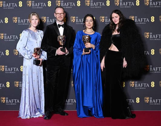 Norwegian film producers Maria Ekerhovd and Andrea Berentsen Ottmar, director Joachim Trier and actress Renate Reinsve attend the Winners Room at the EE BAFTA Film Awards at the Royal Festival Hall in London, England on Sunday, February 22, 2026.  LON202602221122 RUNExHELLESTAD
