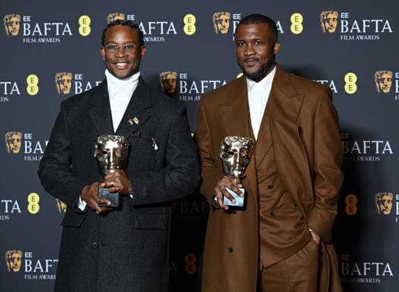 Nigerian- British writer directors Wale Davies and Akinola Davies Jr. attend the Winners Room at the EE BAFTA Film Awards at the Royal Festival Hall in London, England on Sunday, February 22, 2026.  LON202602221109 RUNExHELLESTAD