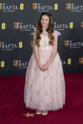 February 22, 2026, London, England, United Kingdom: OLIVIA LYNES attends the red carpet during the EE BAFTA Film Awards 2026 ceremony at The Royal Festival Hall. London United Kingdom  - ZUMAs371 20260222_zip_s371_097 Copyright: xWiktorxSzymanowiczx