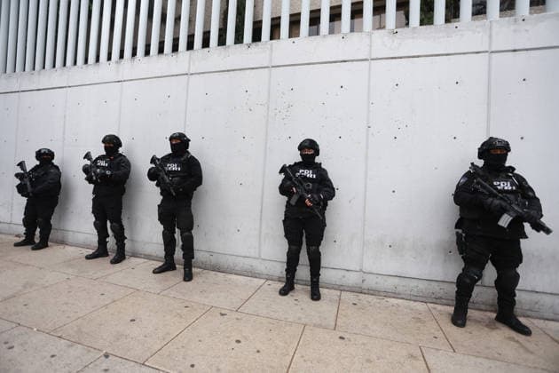 Security presence in Mexico City following killing of cartel leader El Mencho MEXICO CITY, MEXICO - FEBRUARY 22: Members of the Investigative Police stand guard outside the facilities of the Specialized Prosecutor s Office for Organized Crime (FEMDO) in Mexico City, Mexico on February 22, 2026. The security presence outside the FEMDO facilities follows an operation earlier in the day in which cartel leader Nemesio Oseguera Cervantes, known as El Mencho was killed during a military operation in Tapalpa, in the state of Jalisco, authorities confirmed. Daniel Cardenas Anadolu Mexico City Mexico. Editorial use only. Please get in touch for any other usage.  Copyright: x2026xAnadoluxDanielxCardenasx
