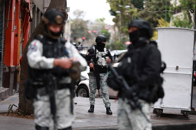 Security presence in Mexico City following killing of cartel leader El Mencho MEXICO CITY, MEXICO - FEBRUARY 22: Members of the National Guard stand guard outside the facilities of the Specialized Prosecutor s Office for Organized Crime (FEMDO) in Mexico City, Mexico on February 22, 2026. The security presence outside the FEMDO facilities follows an operation earlier in the day in which cartel leader Nemesio Oseguera Cervantes, known as El Mencho was killed during a military operation in Tapalpa, in the state of Jalisco, authorities confirmed. Daniel Cardenas Anadolu Mexico City Mexico. Editorial use only. Please get in touch for any other usage.  Copyright: x2026xAnadoluxDanielxCardenasx