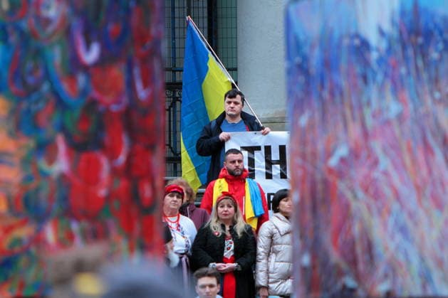 February 22, 2026, Vancouver, Bc, Canada: A man holding an Ukrine flag in Global Rally For Ukraine.Global Rally For Ukraine marking four years since Russia s full-scale invasion,taking place on February 22 at 2:00 PM at the vancouver Art Gallery. Vancouver Canada  - ZUMAa223 20260222_zip_a223_018 Copyright: xMazyarxAsadix