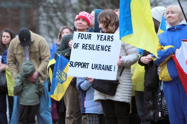 February 22, 2026, Vancouver, Bc, Canada: A woman holding Placard in Global Rally For Ukraine.Global Rally For Ukraine marking four years since Russia s full-scale invasion,taking place on February 22 at 2:00 PM at the vancouver Art Gallery. Vancouver Canada - ZUMAa223 20260222_zip_a223_046 Copyright: xMazyarxAsadix