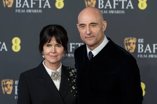February 22, 2026, London, England, United Kingdom: LIZA MARSHALL and MARK STRONG attend the red carpet during the EE BAFTA Film Awards 2026 ceremony at The Royal Festival Hall. London United Kingdom  - ZUMAs371 20260222_zip_s371_225 Copyright: xWiktorxSzymanowiczx