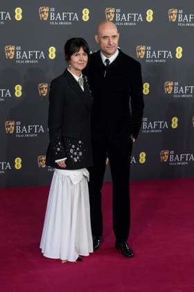 February 22, 2026, London, England, United Kingdom: LIZA MARSHALL and MARK STRONG attend the red carpet during the EE BAFTA Film Awards 2026 ceremony at The Royal Festival Hall. London United Kingdom  - ZUMAs371 20260222_zip_s371_228 Copyright: xWiktorxSzymanowiczx