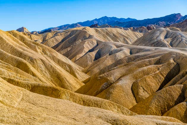 Colorful sandstone formations at Zabriskie Point Death Valley California, RUNF05235