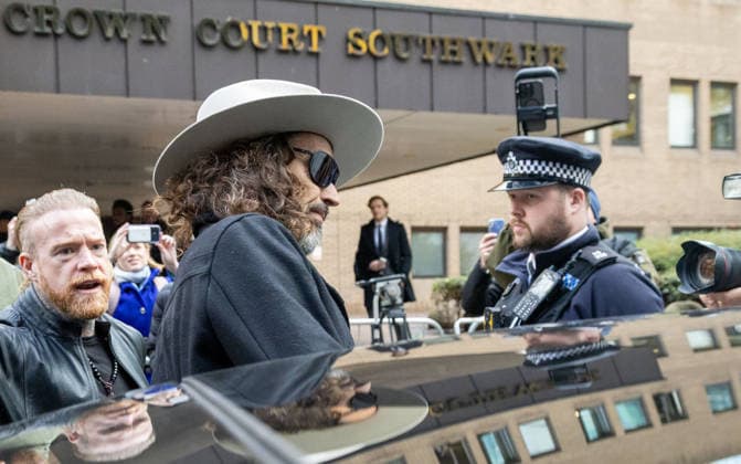 February 24, 2026, London, England, United Kingdom: RUSSELL BRAND departs Southwark Crown Court where he is accused of two further sex offences, including rape, against two further women which allegedly took place in 2009. Brand is already facing allegations of sexual offences against four other women and is due to go on trial in June 2026. London United Kingdom  - ZUMAs262 20260224_zip_s262_001 Copyright: xTayfunxSalcix