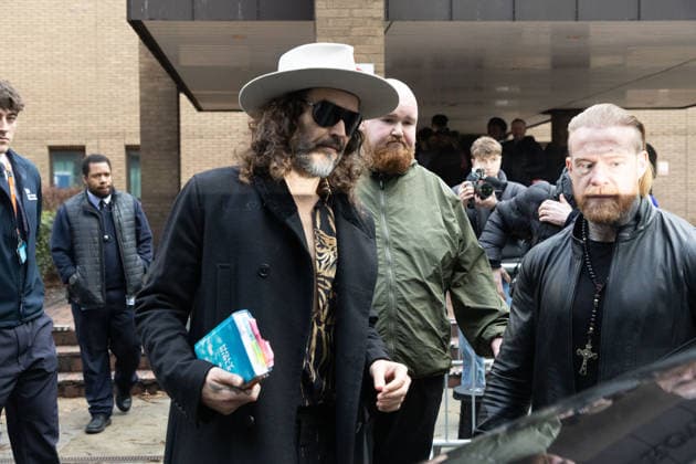 February 24, 2026, London, England, United Kingdom: RUSSELL BRAND leaves Southwark Crown Court where he is accused of two further sex offences, including rape, against two further women which allegedly took place in 2009. Brand is already facing allegations of sexual offences against four other women and is due to go on trial in June 2026. London United Kingdom - ZUMAs262 20260224_zip_s262_024 Copyright: xTayfunxSalcix
