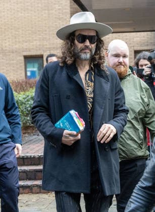 February 24, 2026, London, England, United Kingdom: RUSSELL BRAND leaves Southwark Crown Court where he is accused of two further sex offences, including rape, against two further women which allegedly took place in 2009. Brand is already facing allegations of sexual offences against four other women and is due to go on trial in June 2026. London United Kingdom  - ZUMAs262 20260224_zip_s262_016 Copyright: xTayfunxSalcix