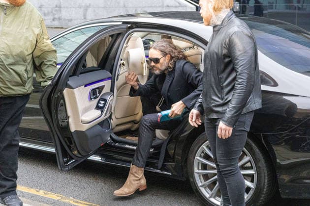 February 24, 2026, London, England, United Kingdom: RUSSELL BRAND arrives at Southwark Crown Court where he is accused of two further sex offences, including rape, against two further women which allegedly took place in 2009. Brand is already facing allegations of sexual offences against four other women and is due to go on trial in June 2026. London United Kingdom  - ZUMAs262 20260224_zip_s262_031 Copyright: xTayfunxSalcix