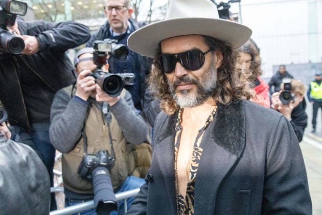 February 24, 2026, London, England, United Kingdom: RUSSELL BRAND arrives at Southwark Crown Court where he is accused of two further sex offences, including rape, against two further women which allegedly took place in 2009. Brand is already facing allegations of sexual offences against four other women and is due to go on trial in June 2026. London United Kingdom  - ZUMAs262 20260224_zip_s262_041 Copyright: xTayfunxSalcix