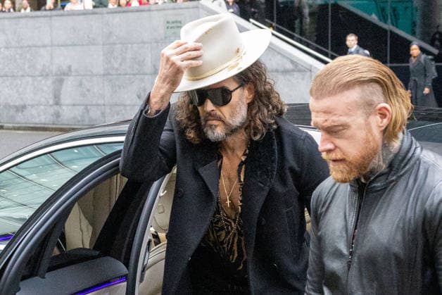 February 24, 2026, London, England, United Kingdom: RUSSELL BRAND arrives at Southwark Crown Court where he is accused of two further sex offences, including rape, against two further women which allegedly took place in 2009. Brand is already facing allegations of sexual offences against four other women and is due to go on trial in June 2026. London United Kingdom  - ZUMAs262 20260224_zip_s262_046 Copyright: xTayfunxSalcix