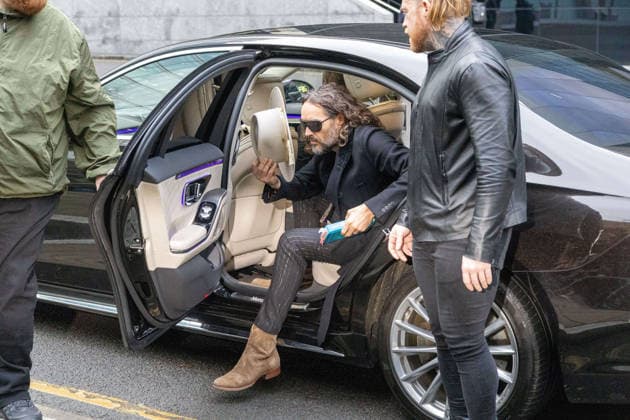 February 24, 2026, London, England, United Kingdom: RUSSELL BRAND arrives at Southwark Crown Court where he is accused of two further sex offences, including rape, against two further women which allegedly took place in 2009. Brand is already facing allegations of sexual offences against four other women and is due to go on trial in June 2026. London United Kingdom  - ZUMAs262 20260224_zip_s262_050 Copyright: xTayfunxSalcix