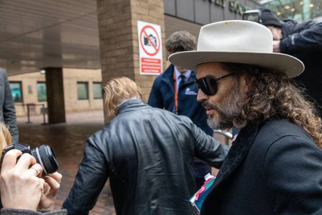 February 24, 2026, London, England, United Kingdom: RUSSELL BRAND arrives at Southwark Crown Court where he is accused of two further sex offences, including rape, against two further women which allegedly took place in 2009. Brand is already facing allegations of sexual offences against four other women and is due to go on trial in June 2026. London United Kingdom - ZUMAs262 20260224_zip_s262_044 Copyright: xTayfunxSalcix