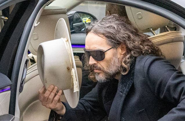 February 24, 2026, London, England, United Kingdom: RUSSELL BRAND arrives at Southwark Crown Court where he is accused of two further sex offences, including rape, against two further women which allegedly took place in 2009. Brand is already facing allegations of sexual offences against four other women and is due to go on trial in June 2026. London United Kingdom - ZUMAs262 20260224_zip_s262_049 Copyright: xTayfunxSalcix