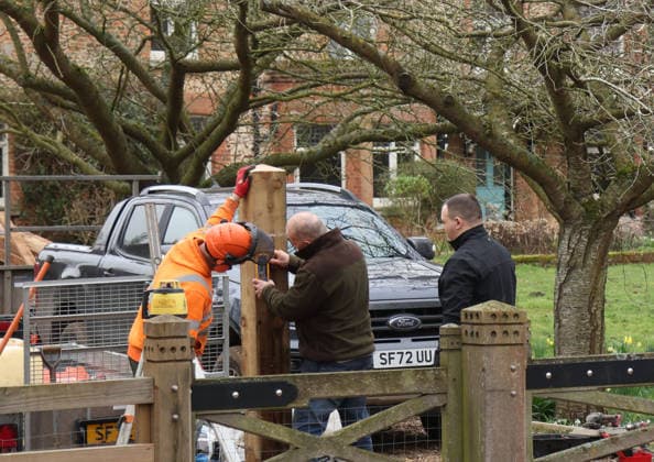A press photographer watches as workers continues to install fencing around Marsh Farm. Marsh Farm is just along the road from Wood Farm on the Sandringham Estate where Andrew Mountbatten-Windsor is staying. Mountbatten-Windsor was arrested last week, and taken to Aylsham police station before being released under investigation, and returning to Wood Farm. Andrew Mountbatten-Windsor, formerly Prince Andrew The Duke of York, has previously denied any wrongdoing in relation to sex offender Jeffrey Epstein. Andrew Mountbatten-Windsor, Sandringham, Norfolk, on 25th February, 2026 