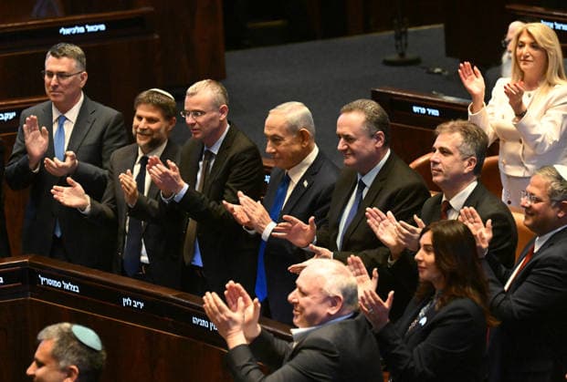 Israeli Prime Minister Benjamin Netanyahu joins Knesset members to applaud for Indian Prime Minister Narendra Modi in the Knesset, the Parliament, in Jerusalem on Wednesday, February 25, 2026.  JER20260222521 DEBBIExHILL