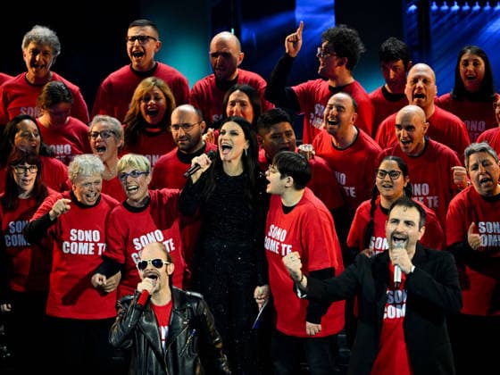 Sanremo, 76th Italian Song Festival. Second Night. Pictured: the Anffas Spezia Choir and Laura Pausini.  Copyright: xMaurizioxD Avanzox xipa-agency.netx xPoolxSanremox02x IPA_Agency_IPA72025354