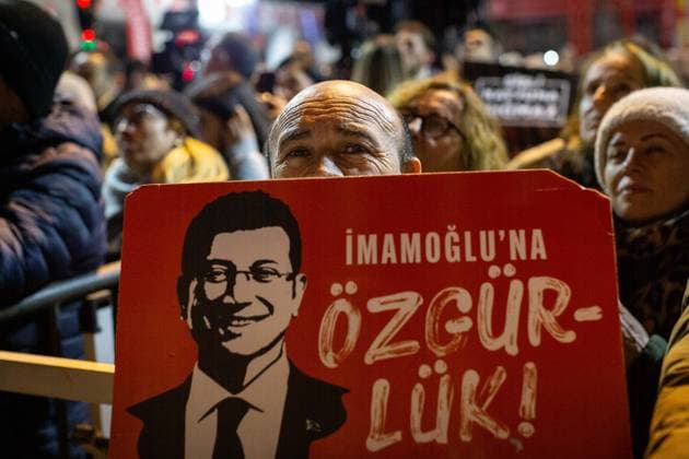 February 25, 2026: Istanbul, Turkey, February 26, 2026: Citizens hold Ekrem Imamoglu posters as they gather in the square. Following the arrest of Ekrem Imamoglu, the first regional gathering in Istanbul of the weekly Ã¢â‚¬oeStand Up for the Will of the PeopleÃ¢â‚¬Â rallies was held at Bakirkoy Cumhuriyet Square. At the 92nd stop of the series, citizens filled the square as The Republican PeopleÃ¢â‚¬â ¢s Party (CHP) Chairman Ozgur Ozel addressed the crowd. - ZUMAi72_ 20260225_znp_i72_015 Copyright: xTolgaxIldunx