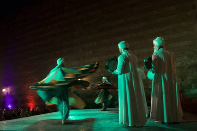The traditional Ramadan custom Tennura dance in Egypt CAIRO, EGYPT - FEBRUARY 25: Tennura dance performances and Sufi music concerts are held daily throughout the holy month of Ramadan at Bayt al-Ghuri in Cairo on February 25, 2026. Wearing colorful skirts, embroidered vests, and white caps, Tennura performers spin around their axis while playing tambourines in rhythm with Sufi music, creating a vibrant and spiritual spectacle. Fareed Kotb Anadolu Cairo Egypt. Editorial use only. Please get in touch for any other usage.  Copyright: x2026xAnadoluxFareedxKotbx