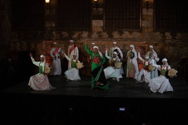 The traditional Ramadan custom Tennura dance in Egypt CAIRO, EGYPT - FEBRUARY 25: Tennura dance performances and Sufi music concerts are held daily throughout the holy month of Ramadan at Bayt al-Ghuri in Cairo on February 25, 2026. Wearing colorful skirts, embroidered vests, and white caps, Tennura performers spin around their axis while playing tambourines in rhythm with Sufi music, creating a vibrant and spiritual spectacle. Fareed Kotb Anadolu Cairo Egypt. Editorial use only. Please get in touch for any other usage.  Copyright: x2026xAnadoluxFareedxKotbx